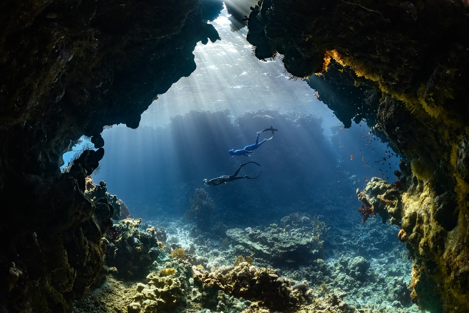 Scuba diver in blue water